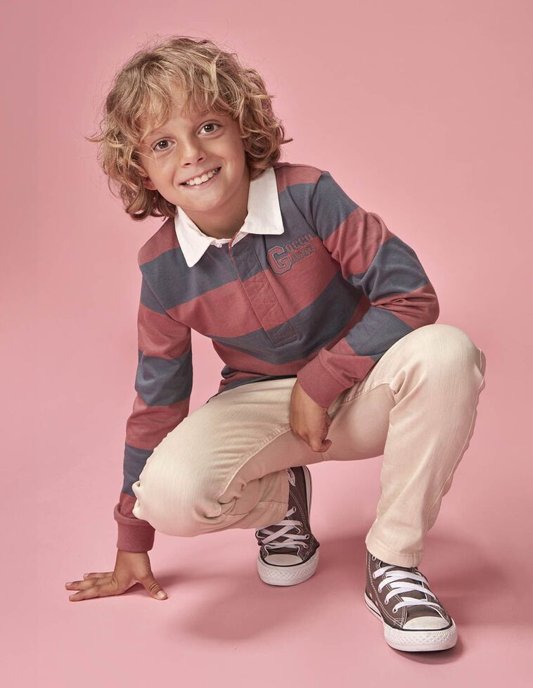 Polo de rayas con parche rosa