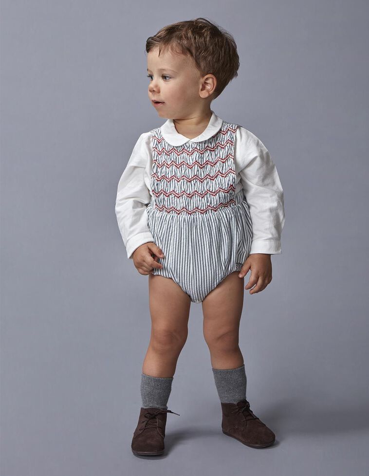 Ranita de rayas con smock azul claro