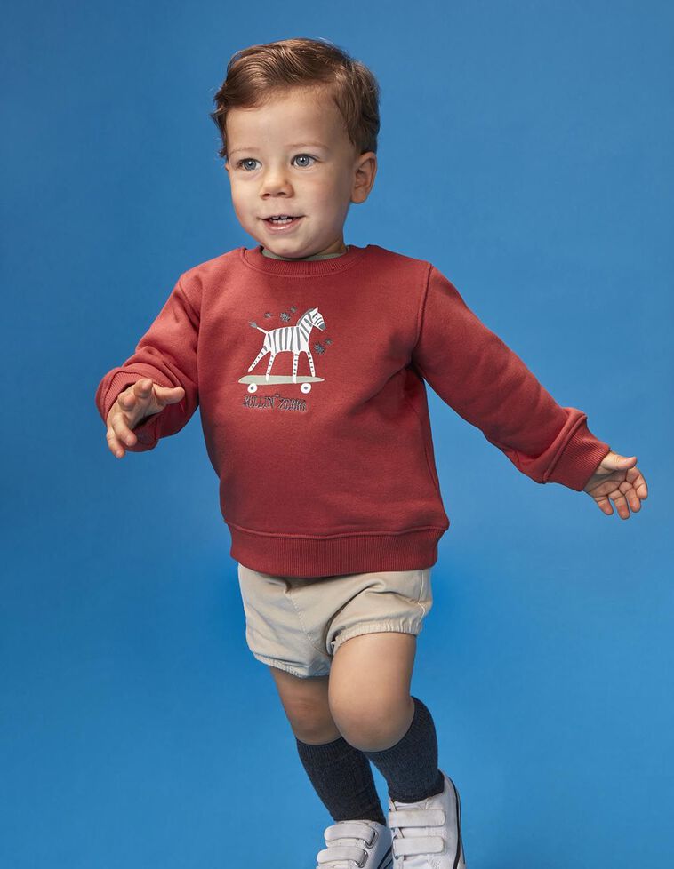 Sudadera con print cebra granate